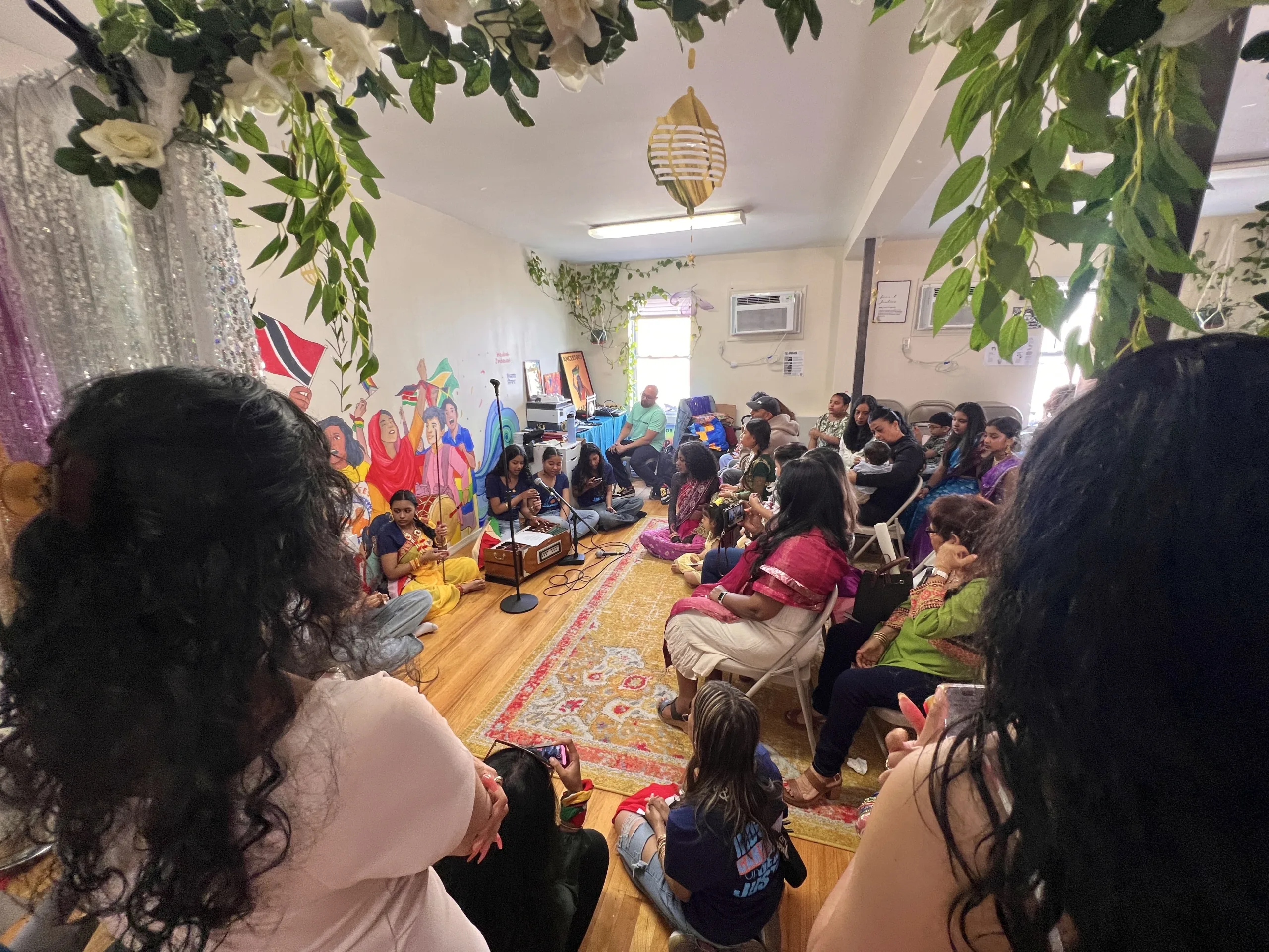 
            Family and friends attend Youth Artivism Academy celebration.